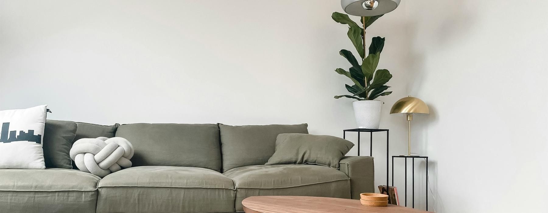 a living room with a couch and a coffee table